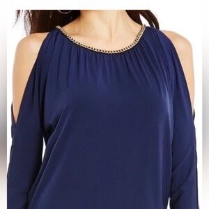 Michael Kors blouse with golden detail and shoulder cutouts. Size S